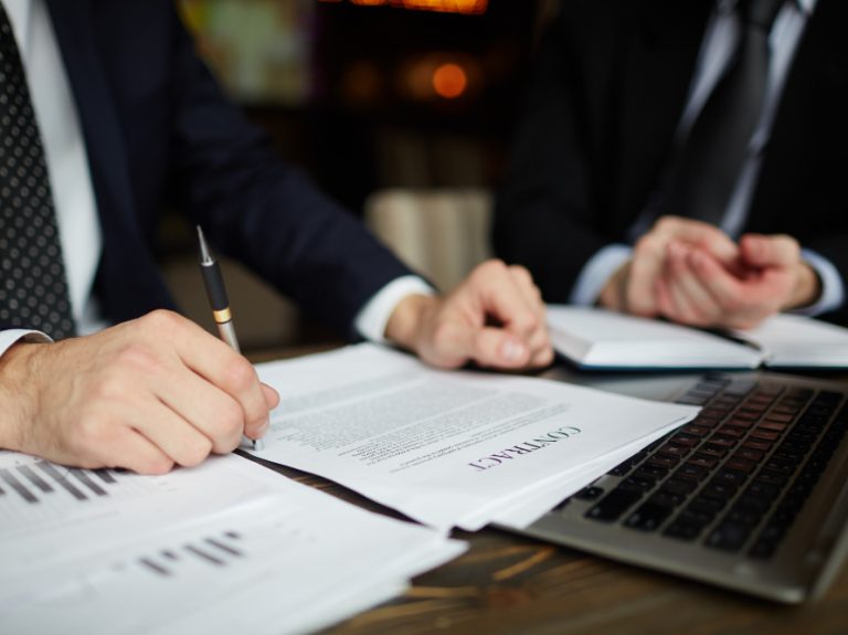 businessman-reading-contract-closeup